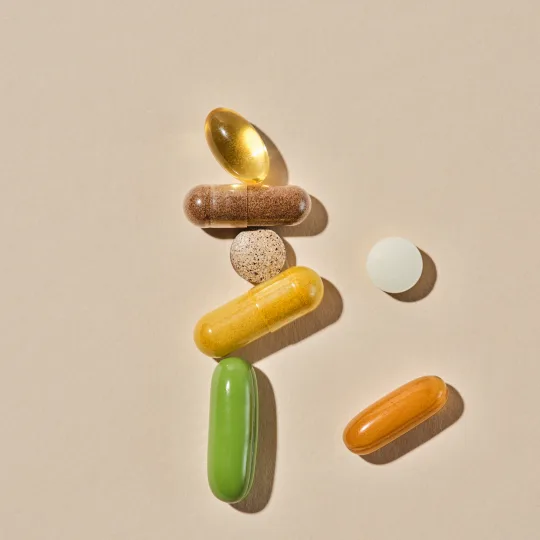 Supplements laid out on a neutral background
